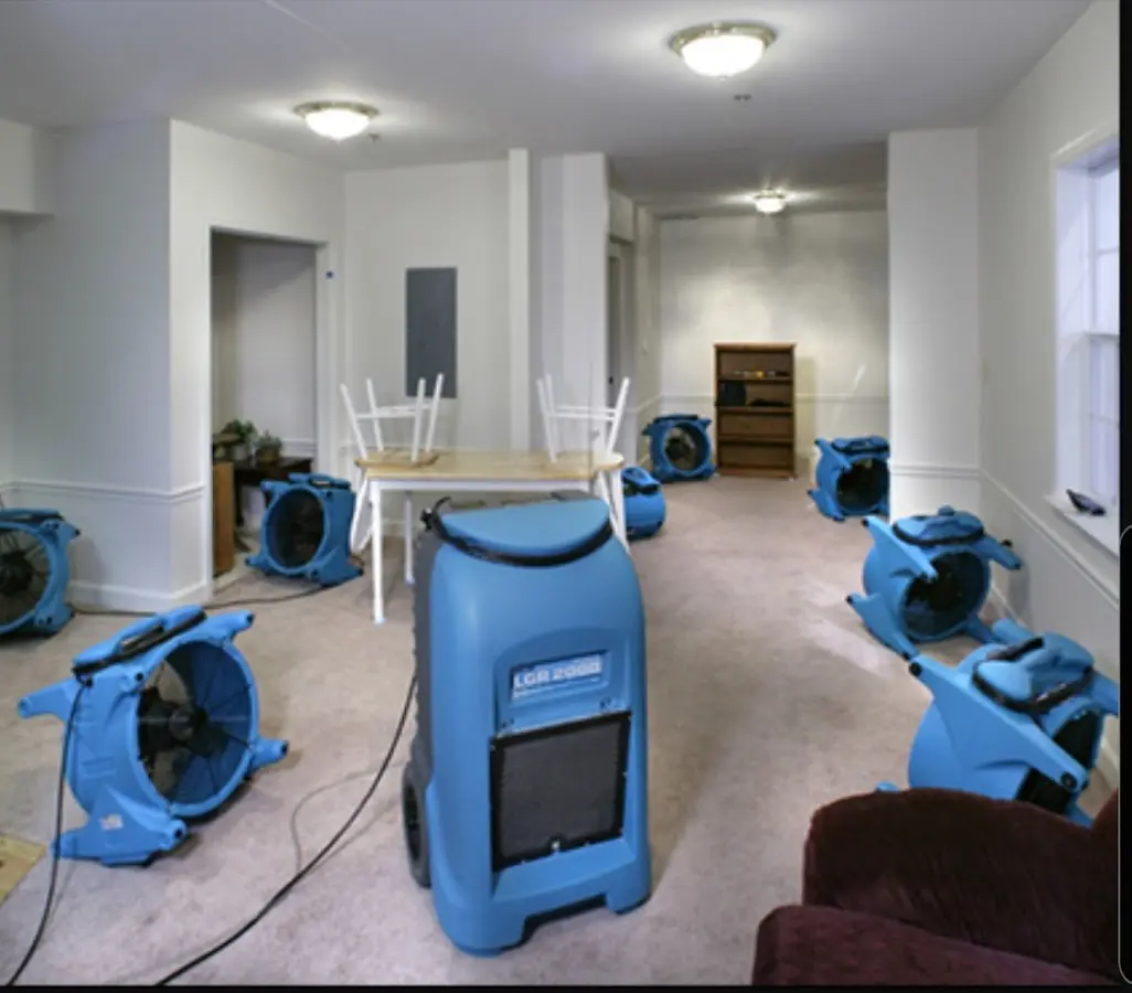 Air movers and dehumidifier setup for Water Damage Restoration in Magnolia